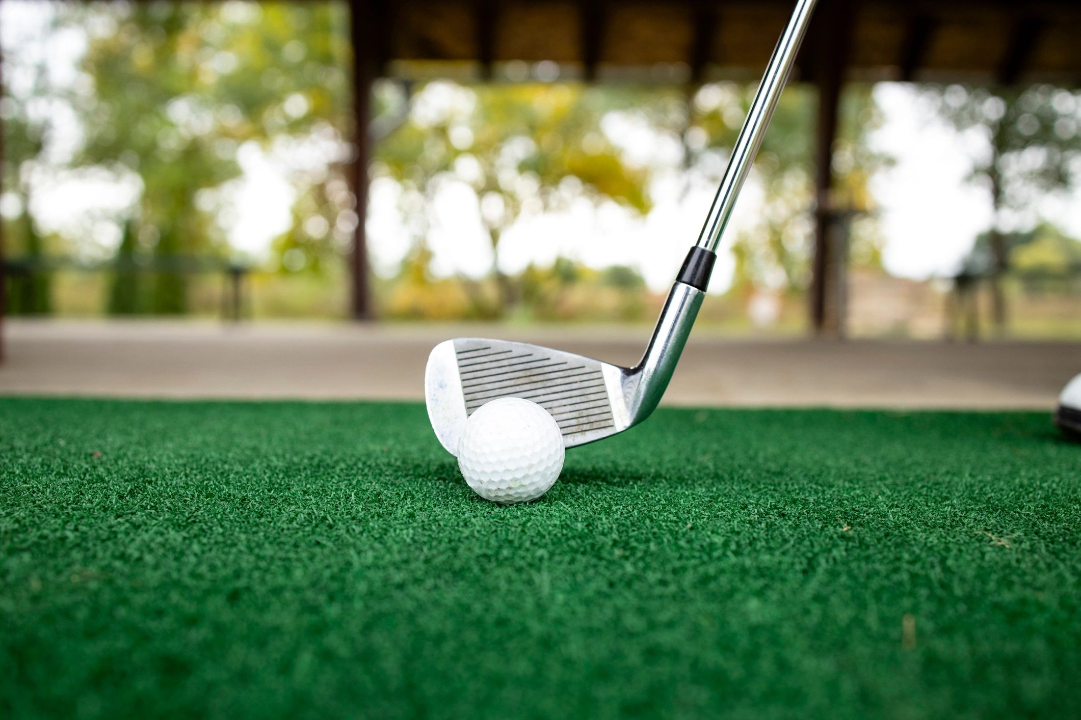 Golfer preparing to hit the ball on the course