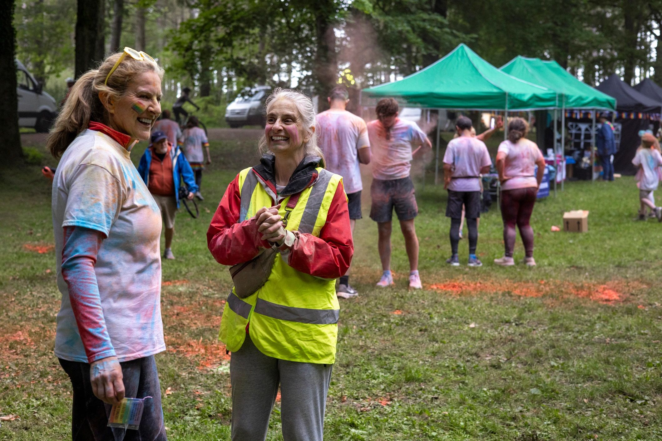 Volunteer smiling at a community event