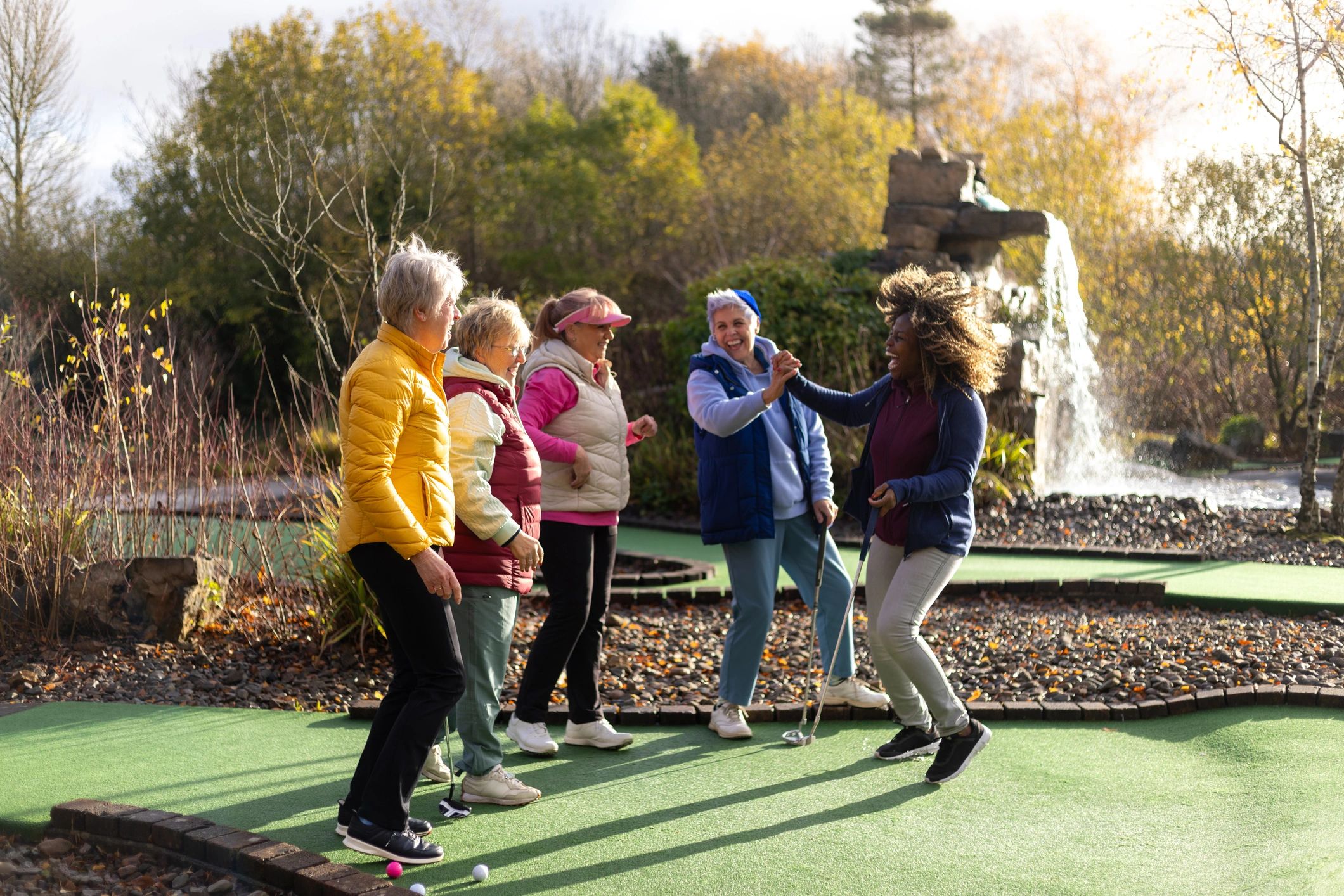 Friends celebrating a successful shot together